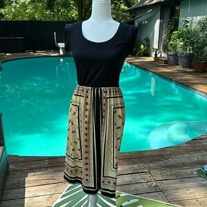 Vintage size small knee length sleeveless dress